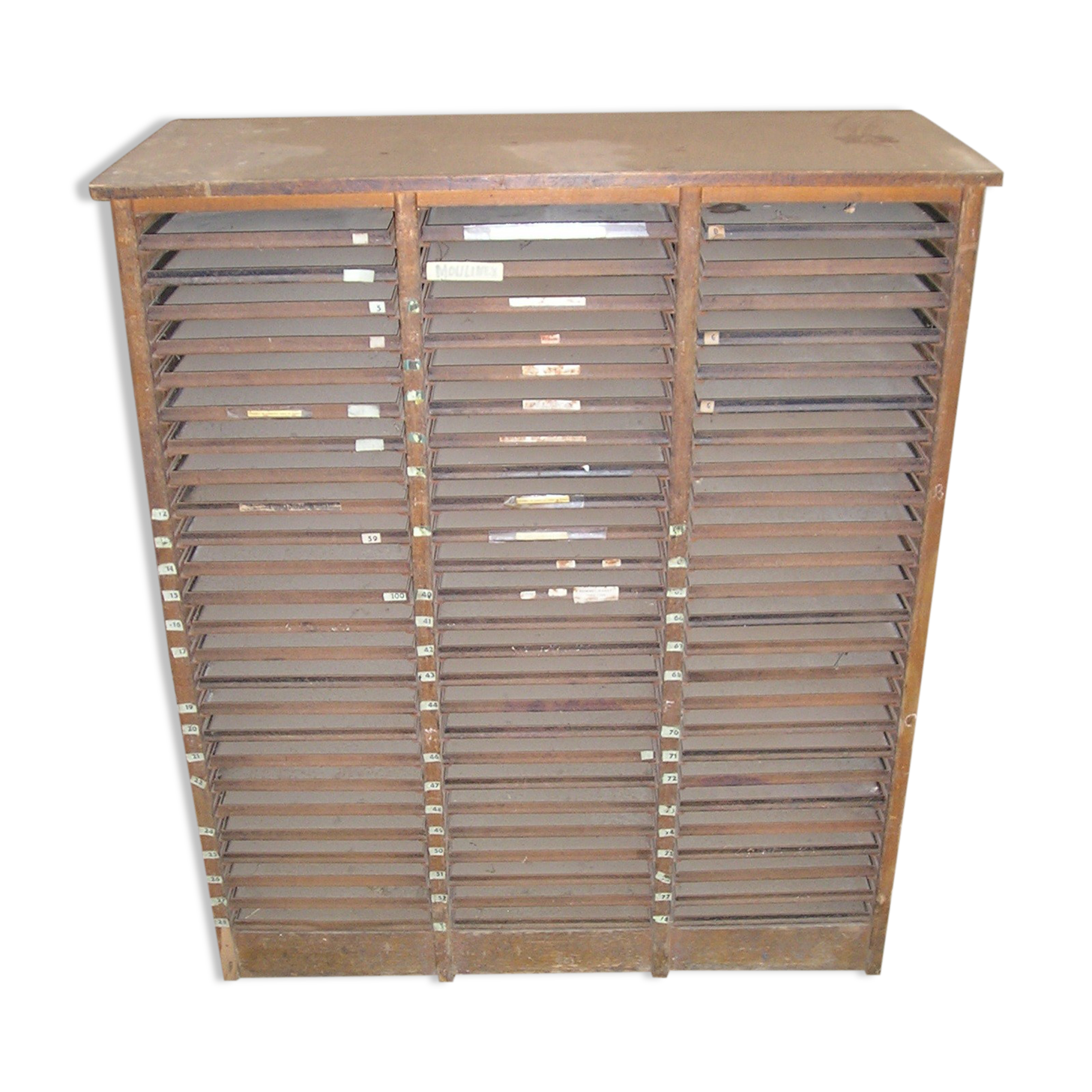 Furniture for printing trades with 75 metal drawers
