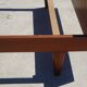 Antique teak bed with integrated bedside table