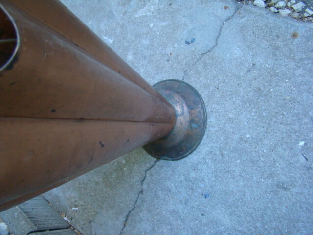 Old copper umbrella holder