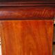 Antique mahogany chest of drawers with white marble.