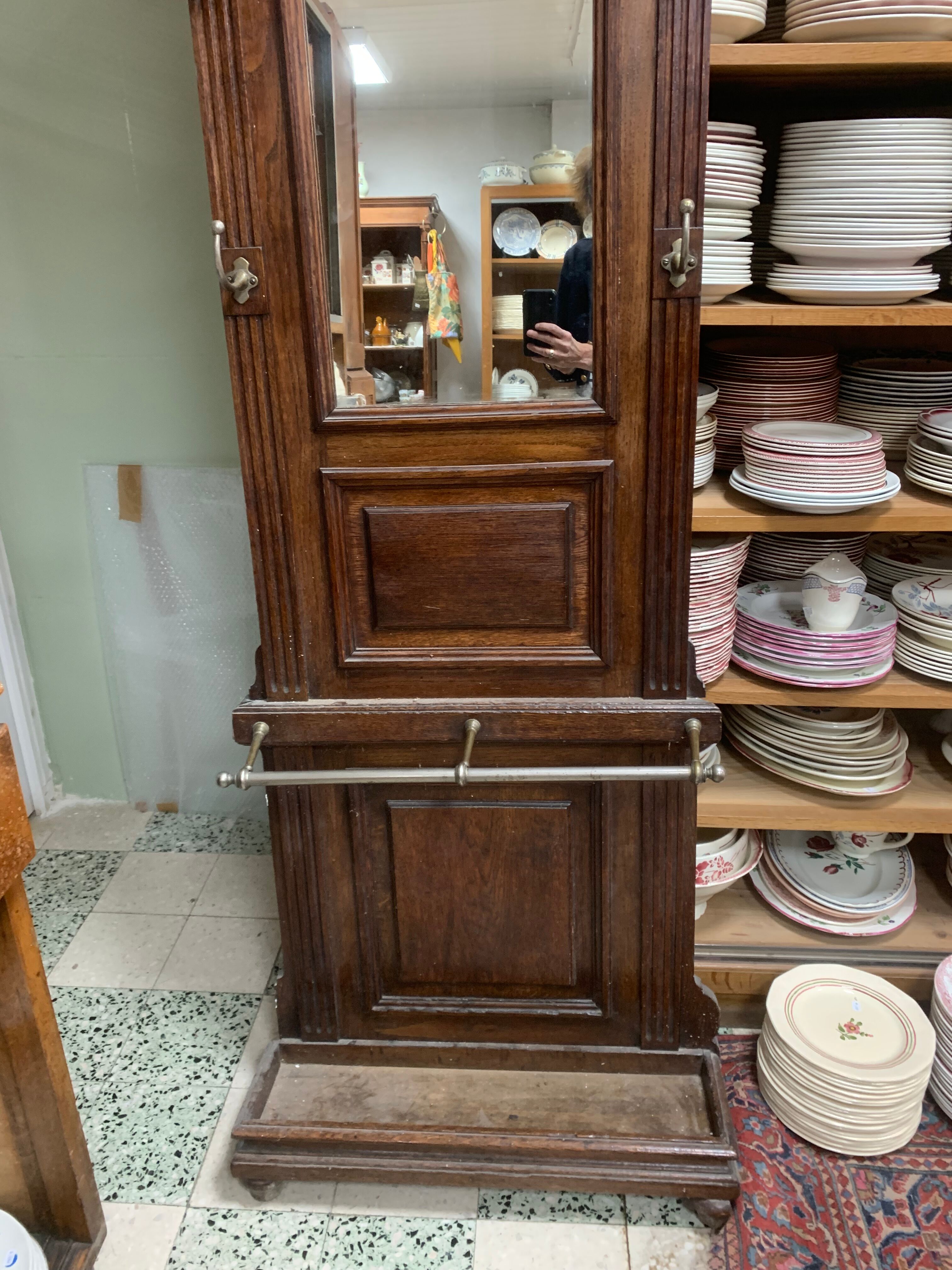 Old wall-mounted mantle-holder cloakroom in see