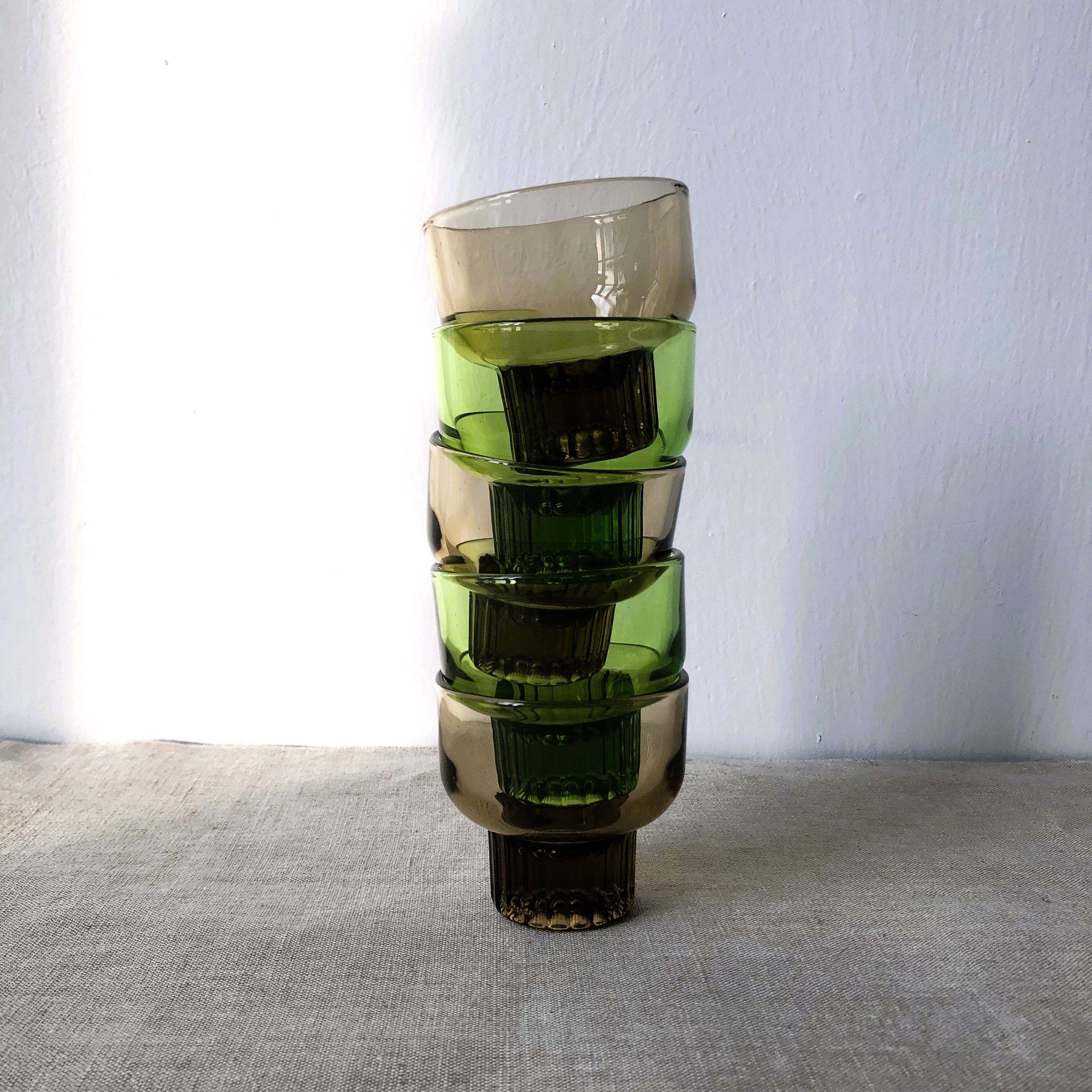 Shooters, translucent brown smoked and green shot glasses, ribbed foot
