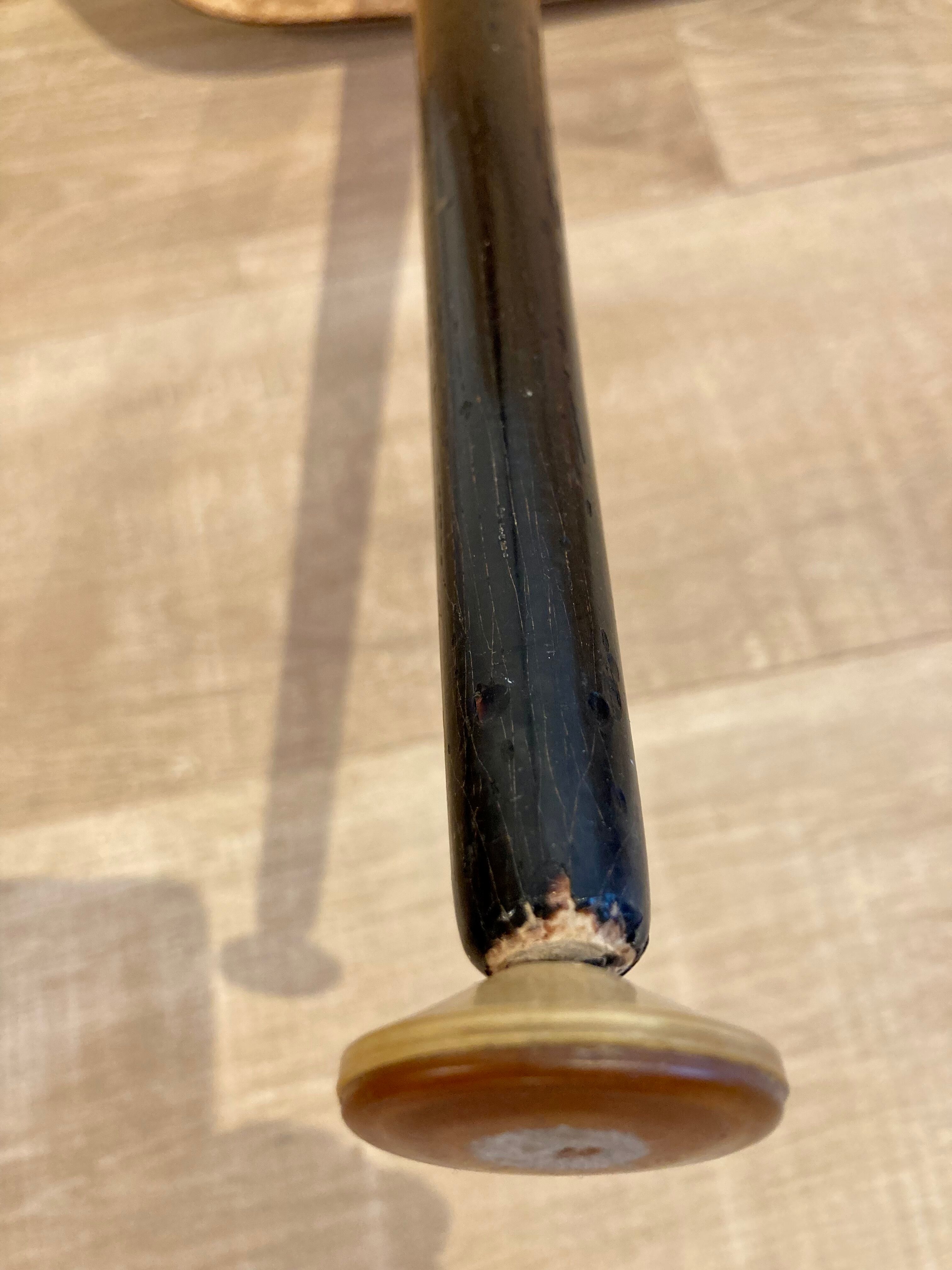 Black glass coffee table wooden legs 60s