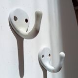 Antique enamelled cast iron wall hook from the 30s/40s