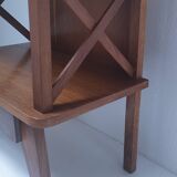 vintage wooden bedside table with crossbars and tapered legs