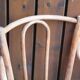 Curved wooden armchair