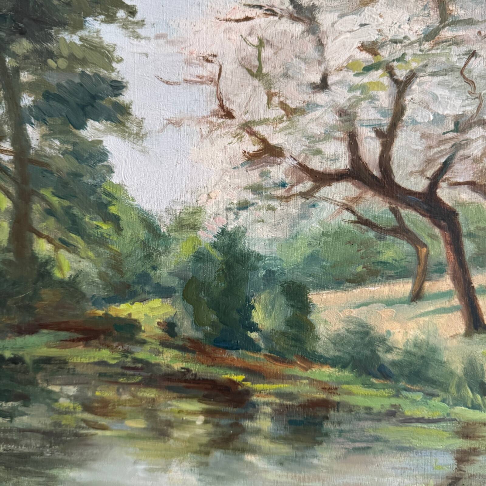 Oil on panel 20th century watercourse trees in bloom blackened wooden frame