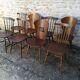 Eight mismatched bistro chairs