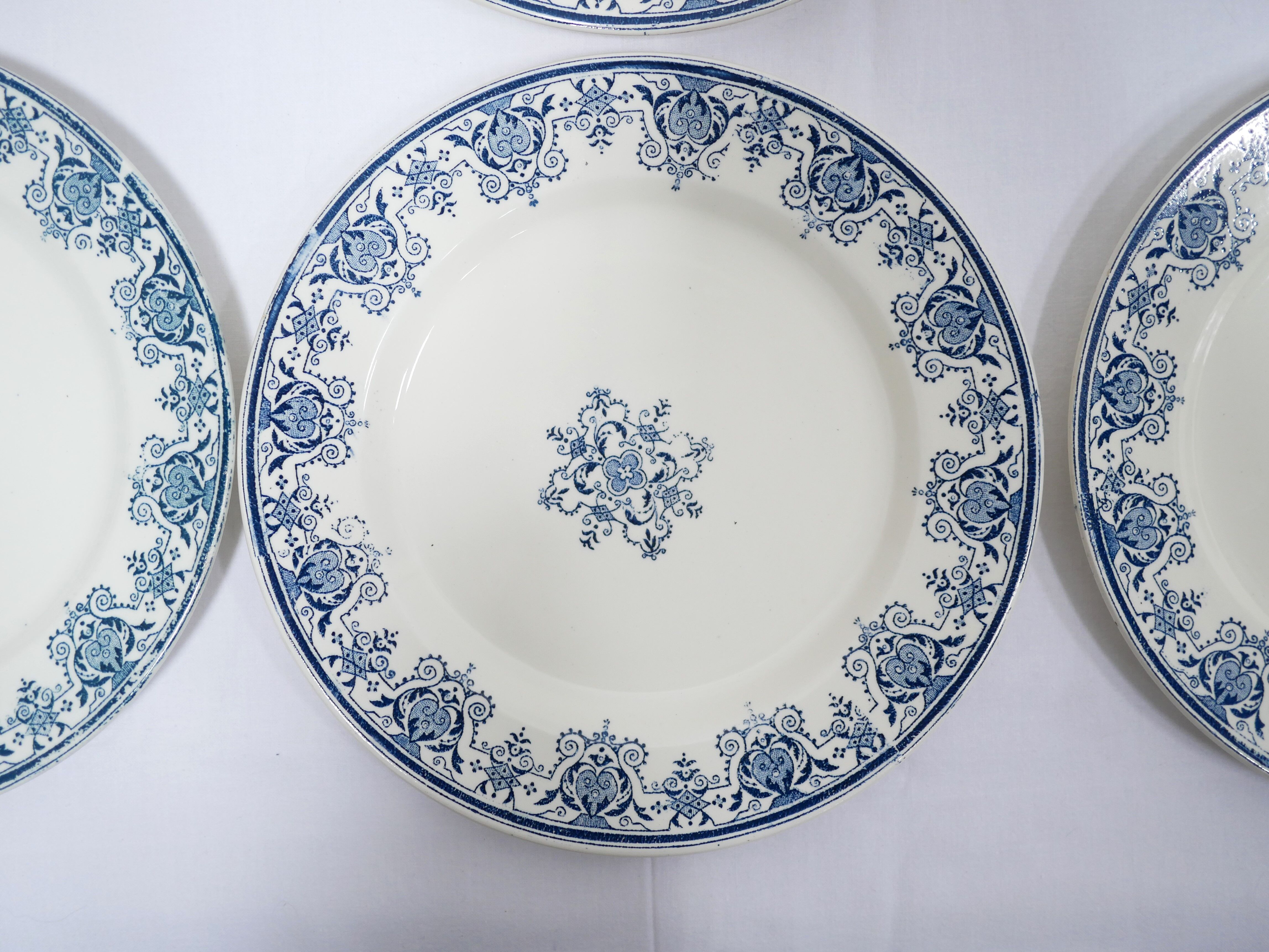 Series of 10 old Terre de Fer plates by L.G. for the earthenware factory of Clairefontaine
