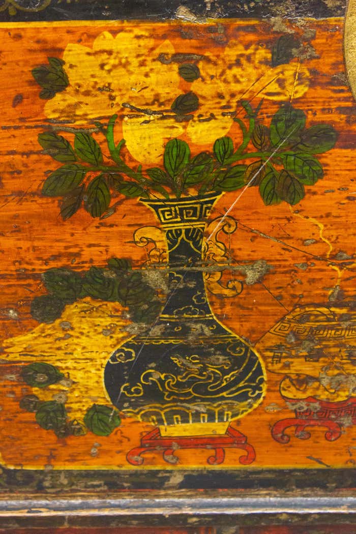 Brown and gold lacquered Chinese chest decorated with flowers circa 1900