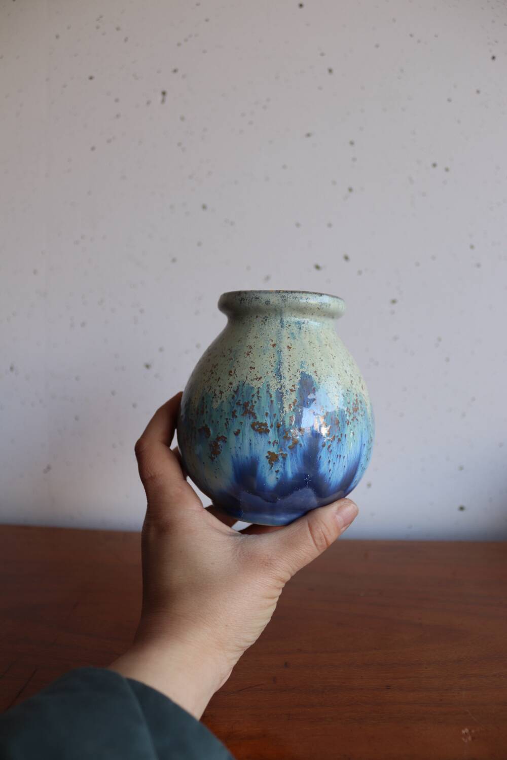 Small vase in glazed blue stoneware.