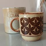 Coffee pot and mug cup in sandstone