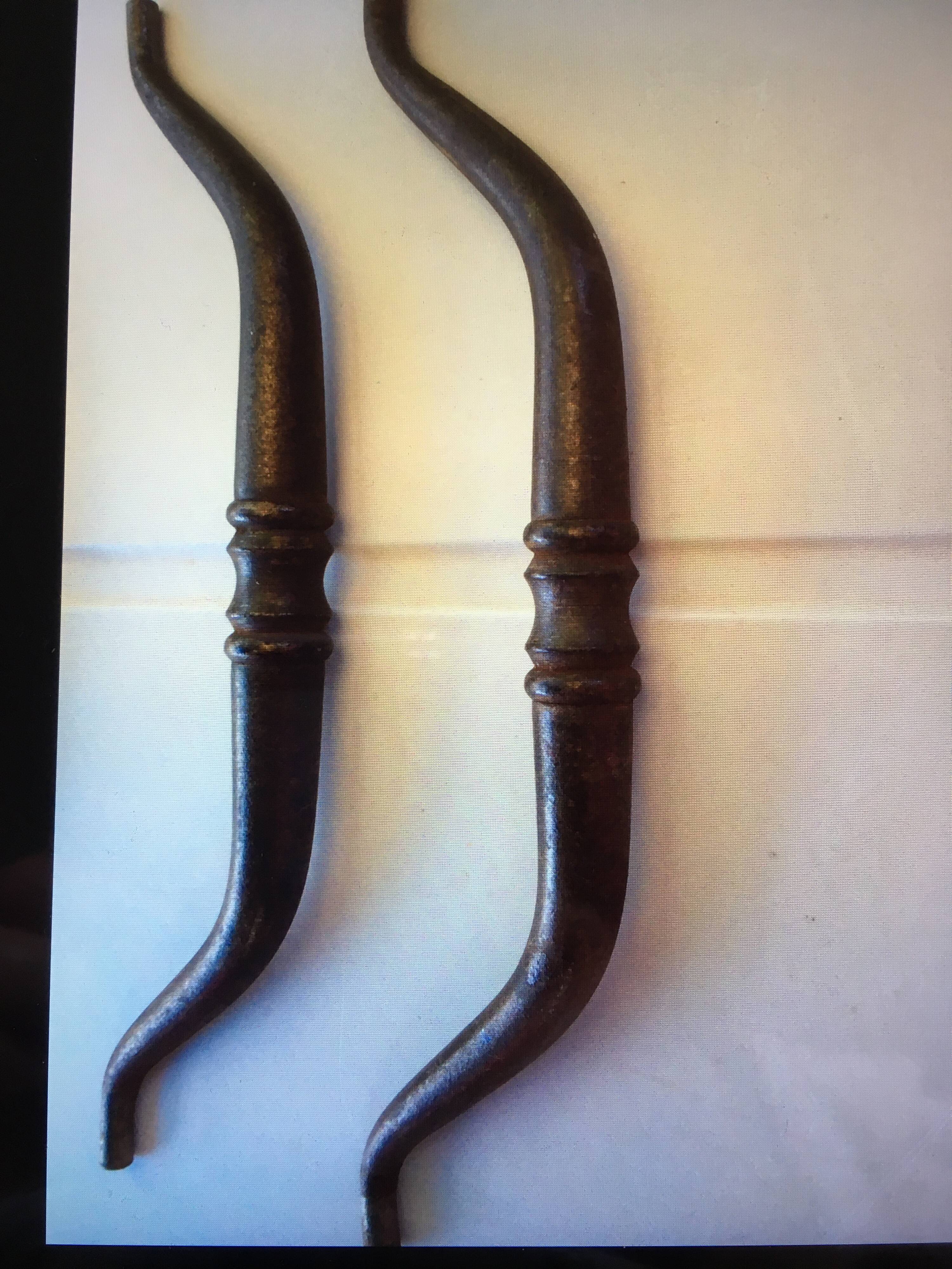 Antique metal handles.