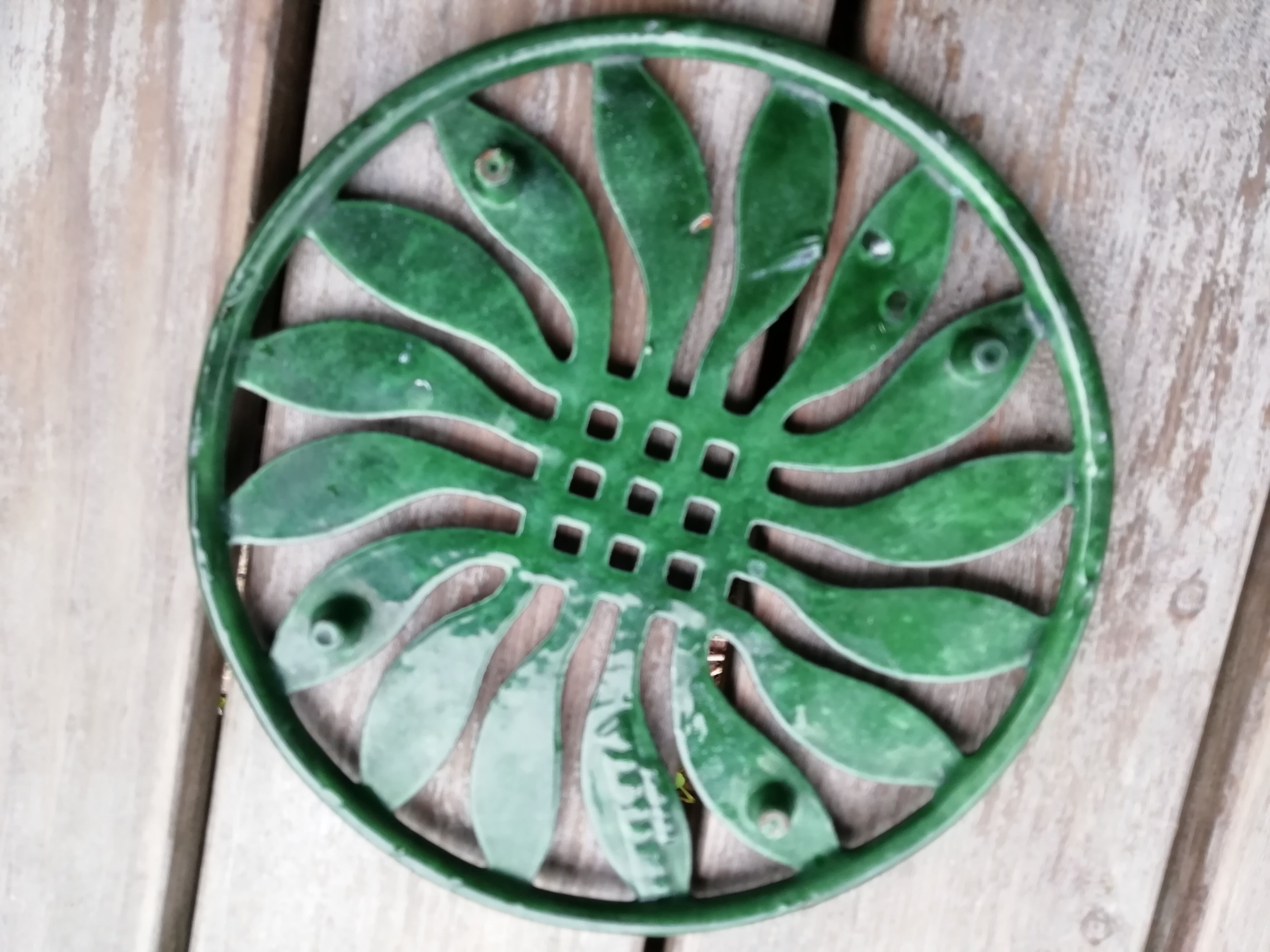 Pair of cast iron table mats