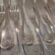 11 silver-plated fish forks and 11 fish knives by Christofle Vendome