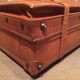 Thick leather suitcase
