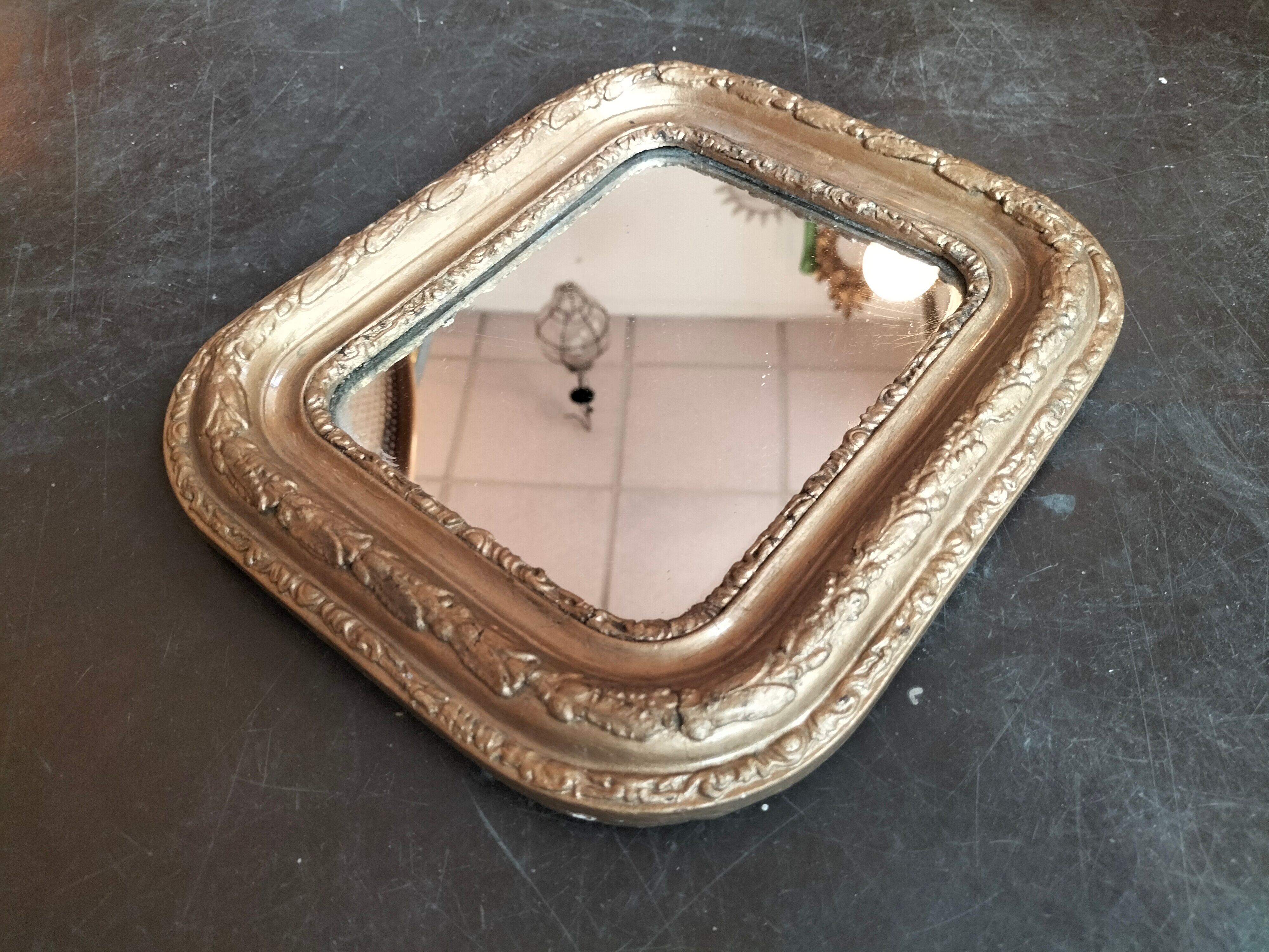 Small old mirror