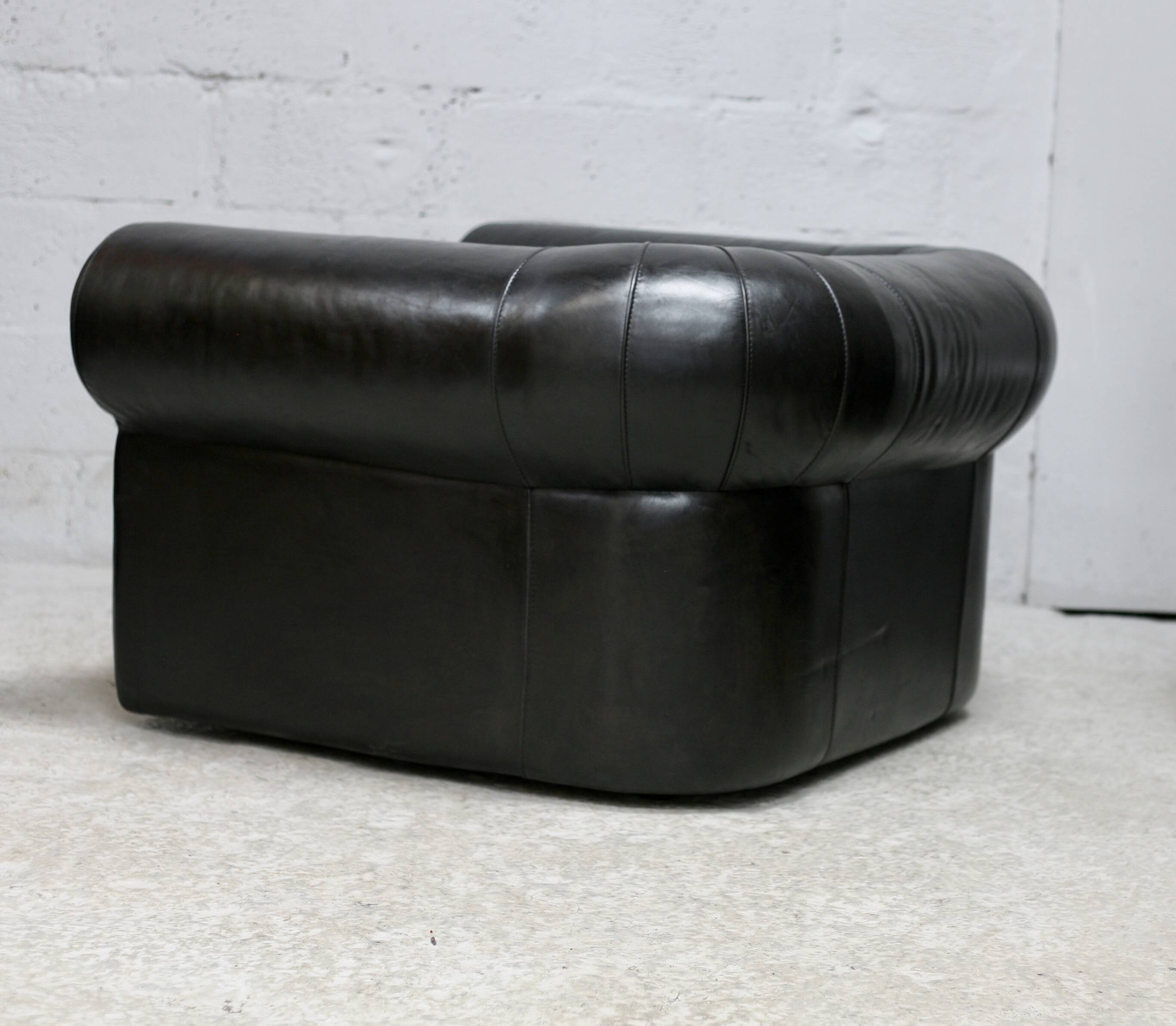 Large black leather armchair, France, 1980s
