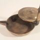 Old oil lamp in golden brass to hang
