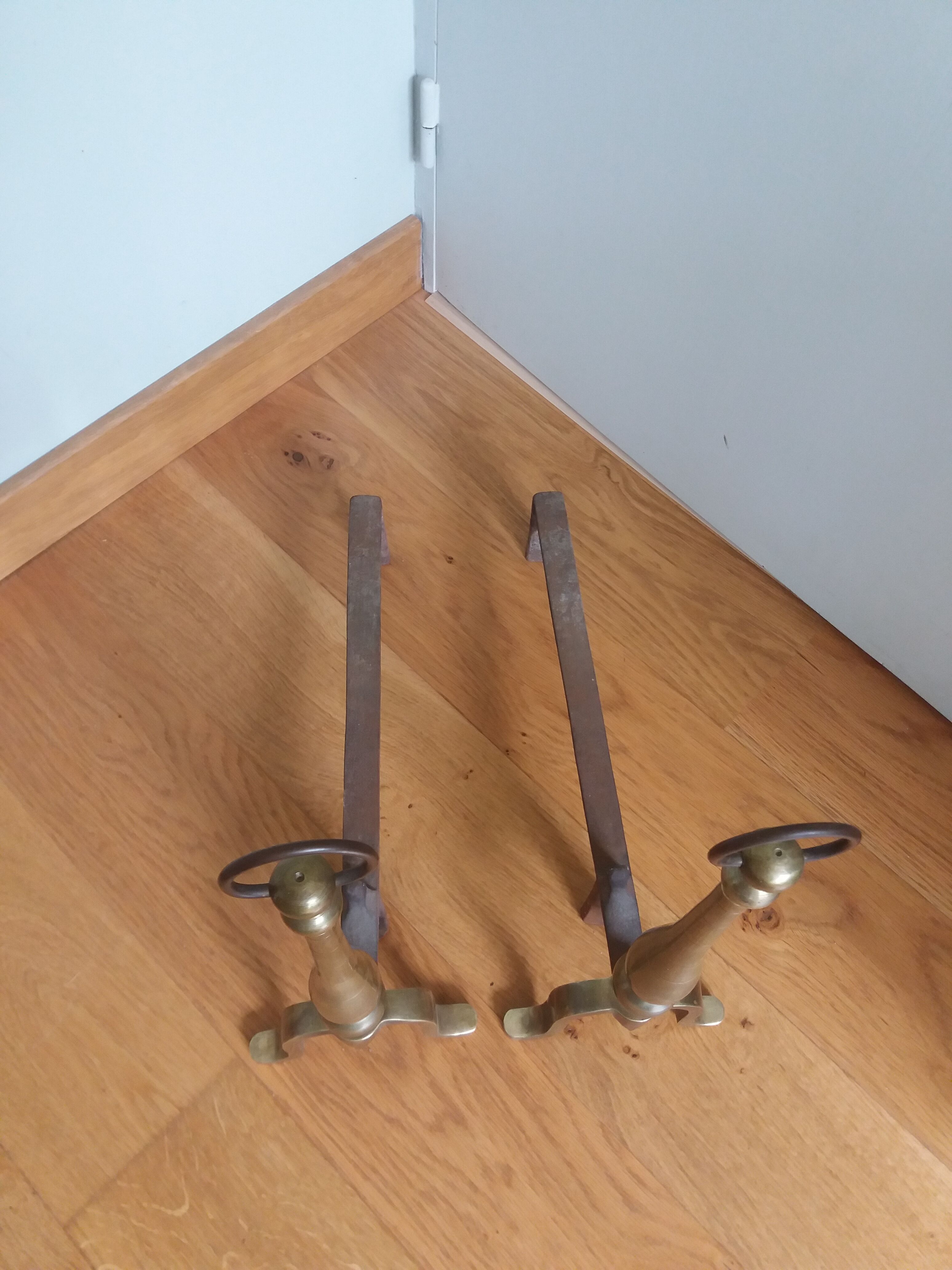 Brass or bronze andirons