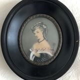 Portrait of a miniature young woman