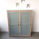 Verdigris two-door wardrobe