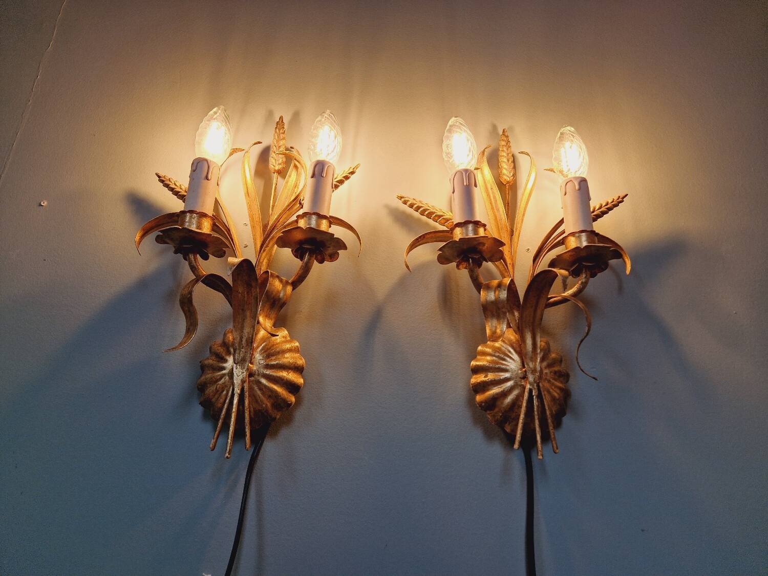 Pair of Italian wall sconces in gilded metal