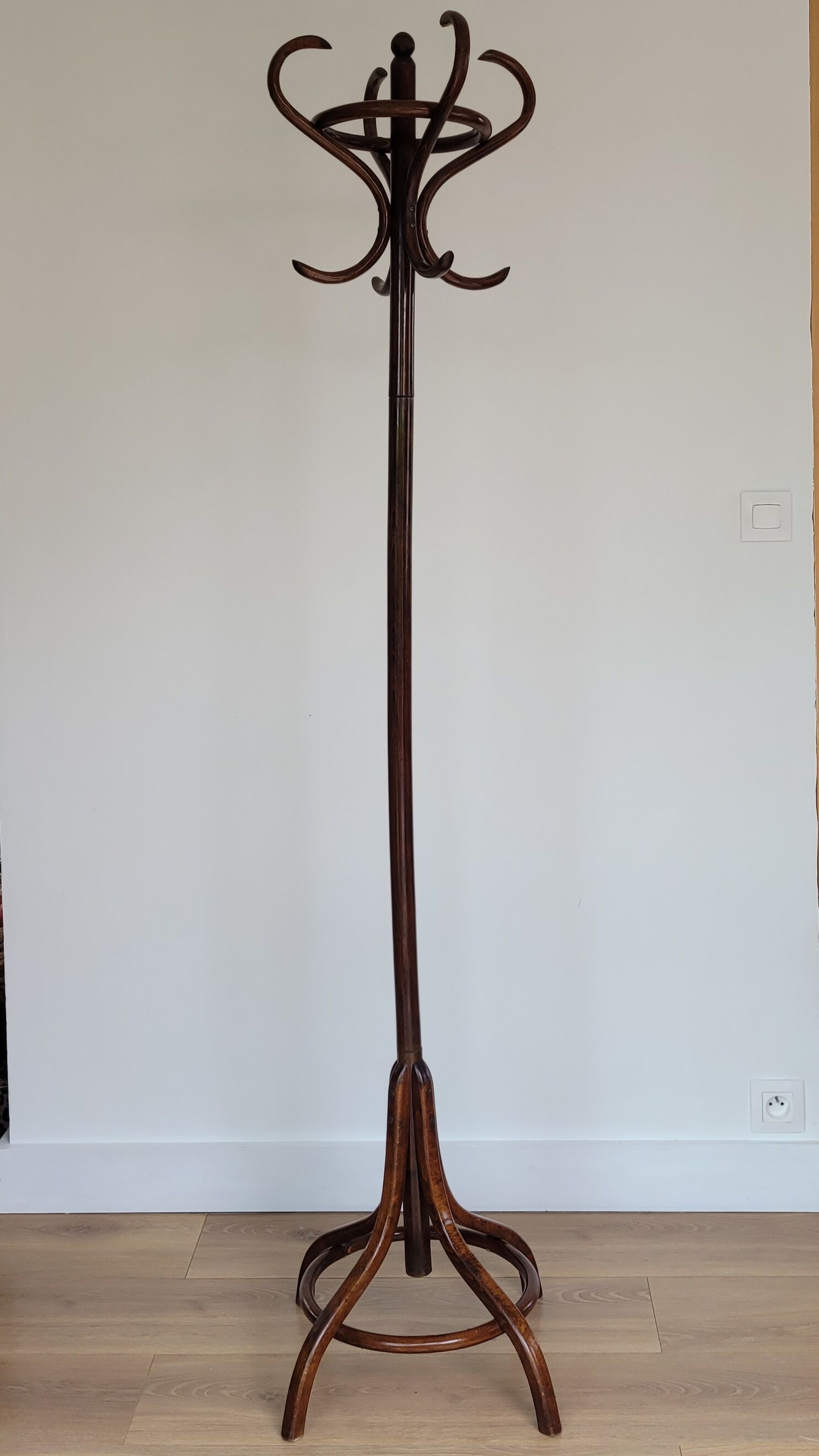 Wooden parrot coat rack on foot