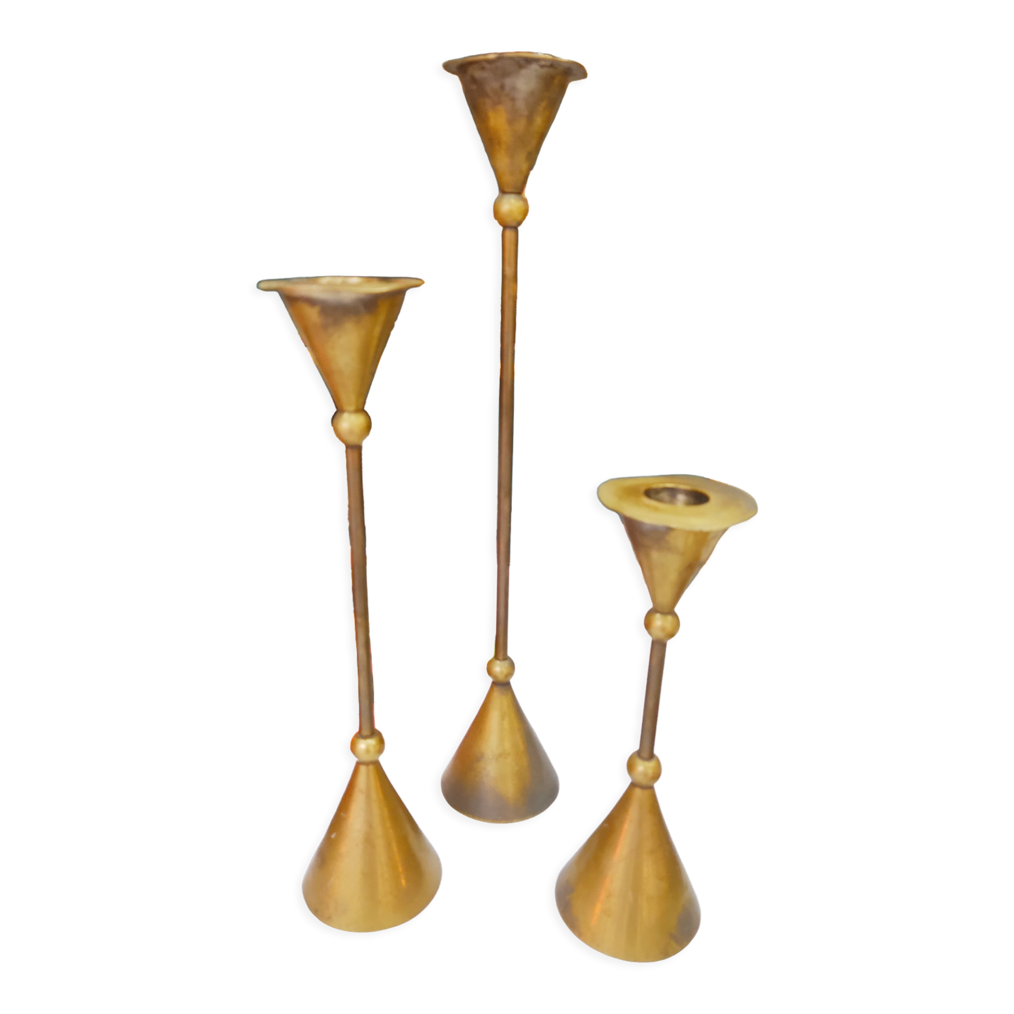 Trio of brass candlesticks design year 70