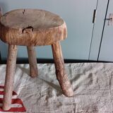 Old small country stool in raw wood - tripod base