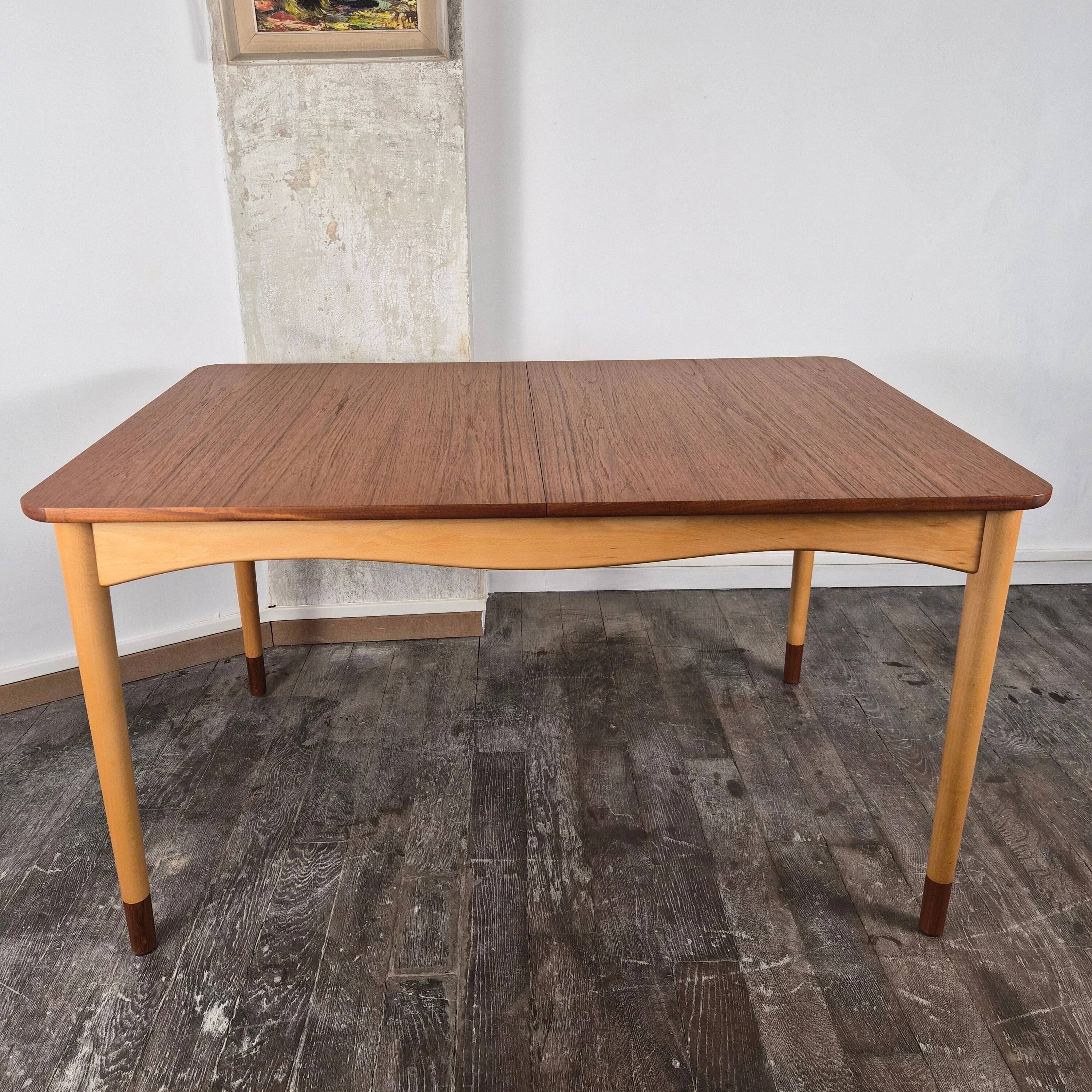 Rare teak and maple dining table with 2 extensions by Finn Juhl for Bovirke, Denmark, 1950.