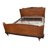 Brown lacquered wooden double bed frame in Mid-Century style from the 1940s.