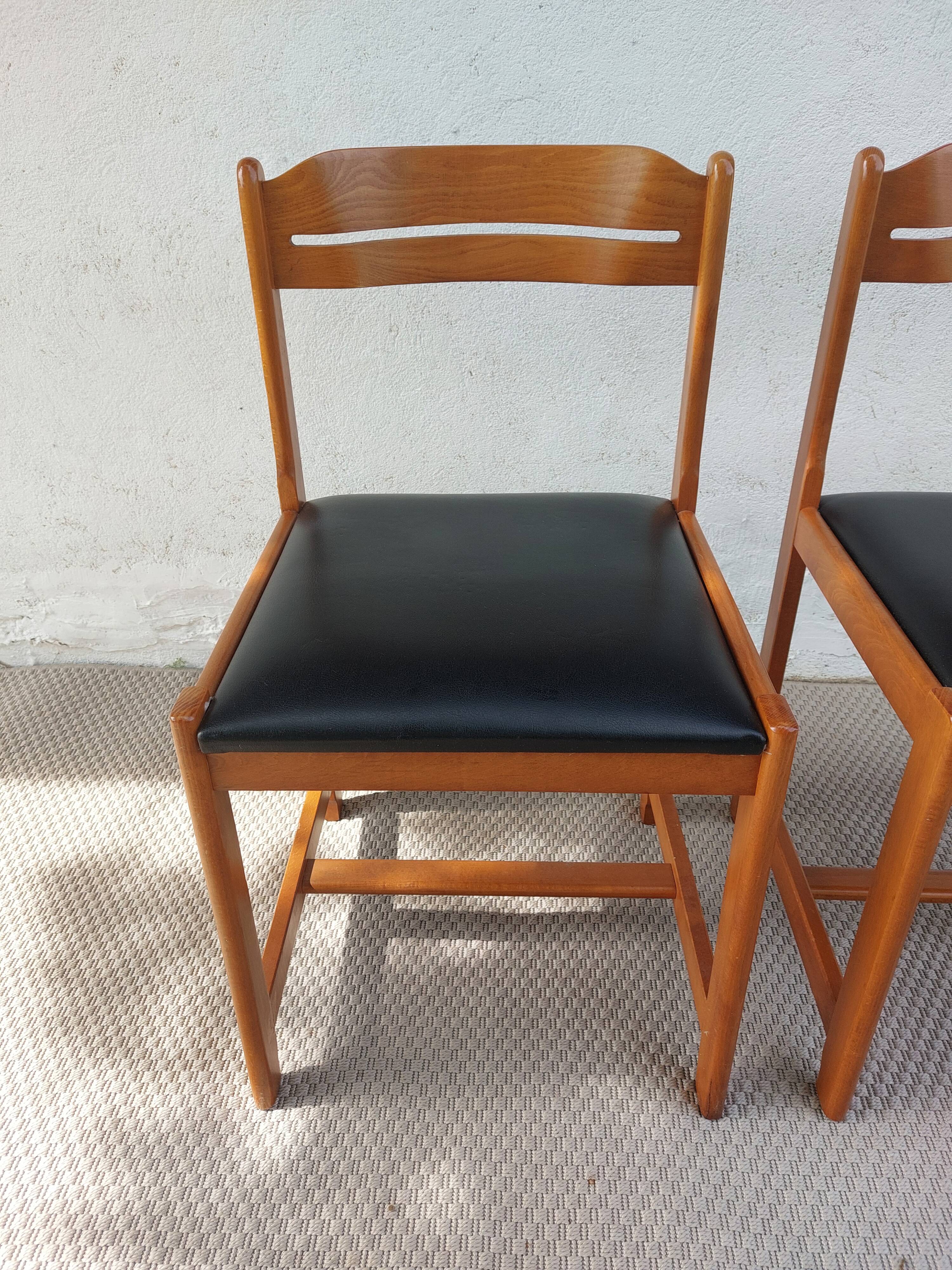 paire de chaises style scandinave, simili cuir noir