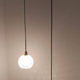 Two-light pendant in a cascade of cut crystal globe