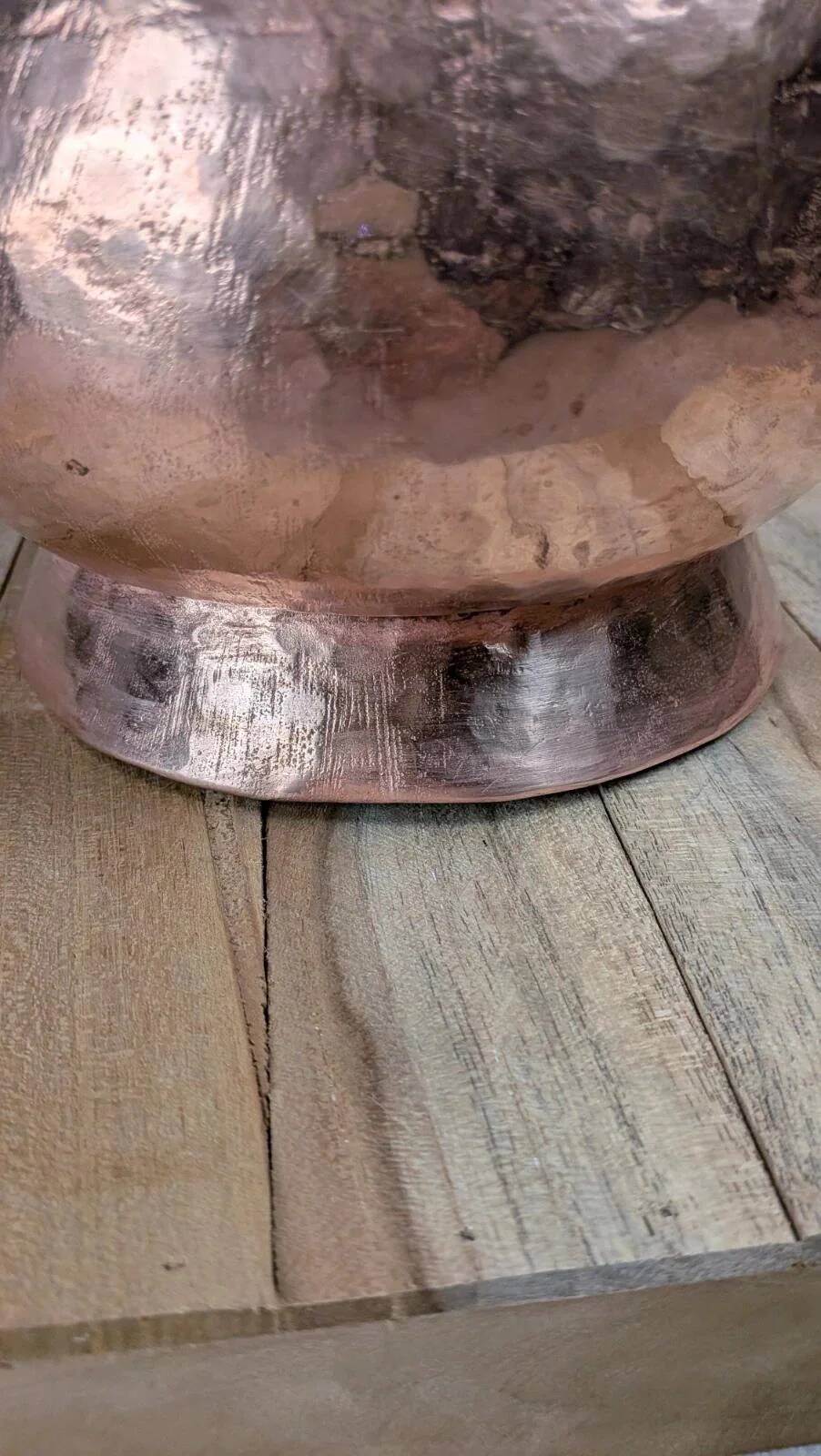 Antique hammered copper jug