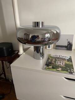 The "Bubble" table lamp in chrome finish, resulting from the collaboration.