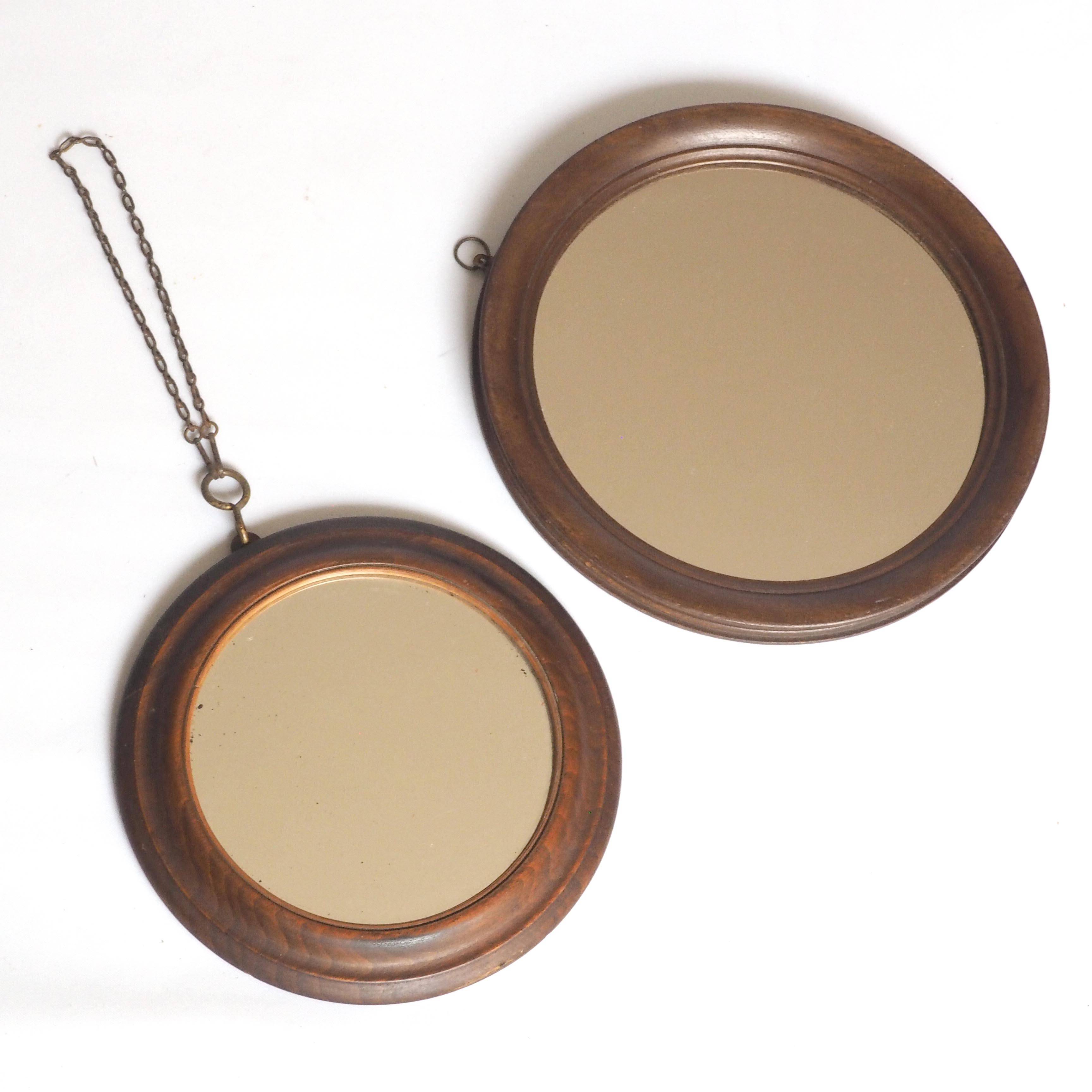 Duo old round wooden mirrors