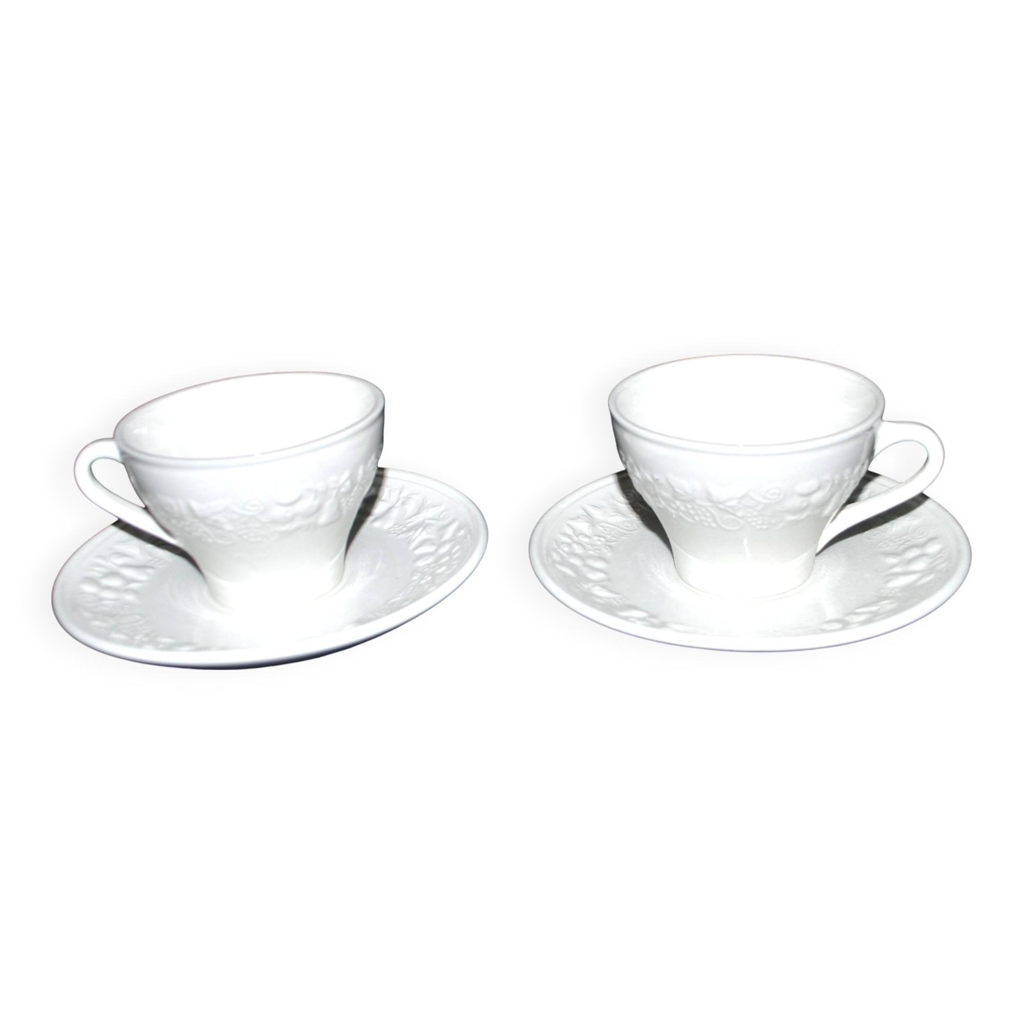 Set of 2 cups molded in opaque Sarreguemines earthenware