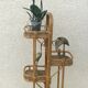 Rattan and bamboo plant rack from the 70s