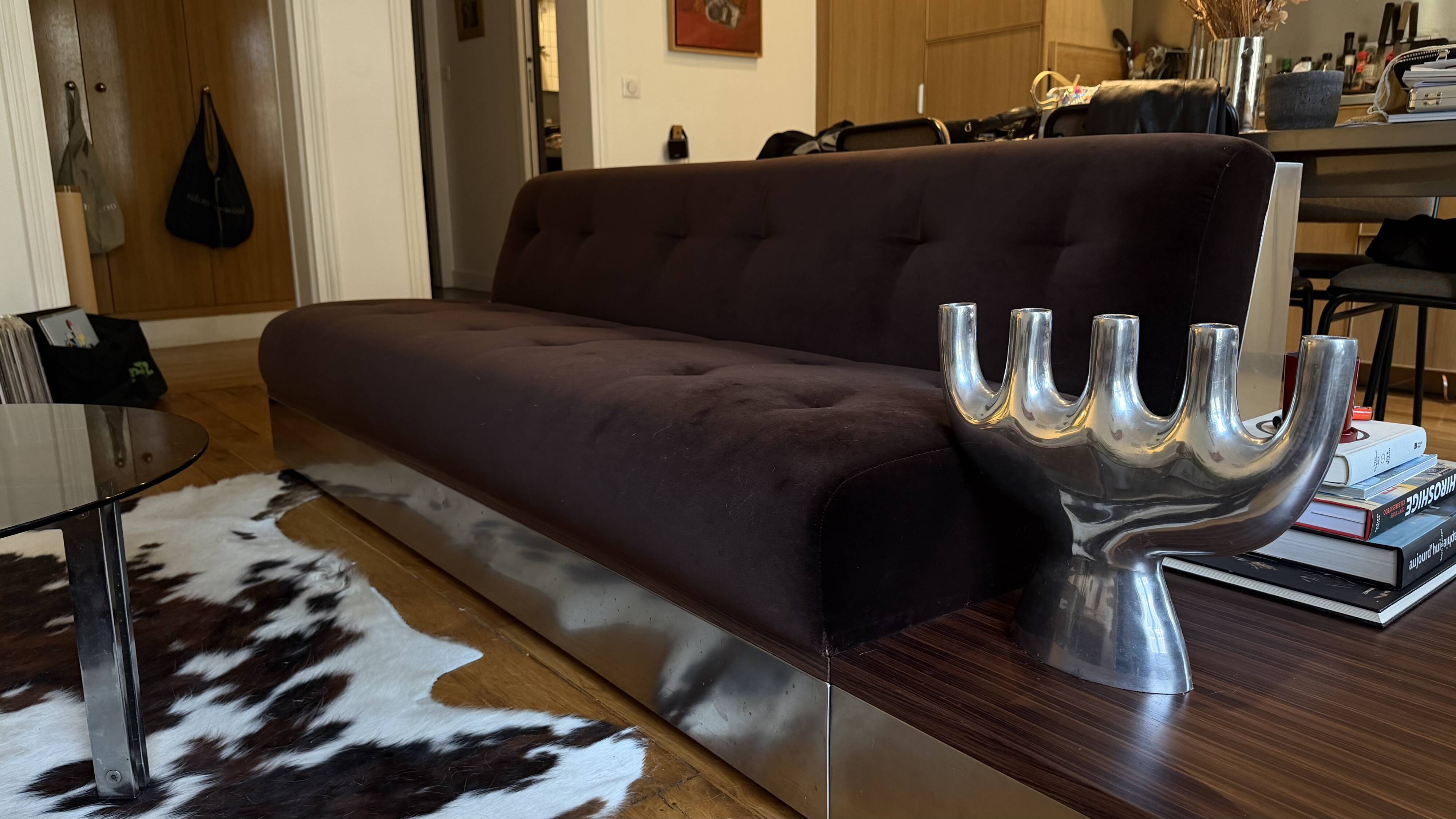 Red Edition Stanley 3-seater sofa with matching chocolate velvet storage.