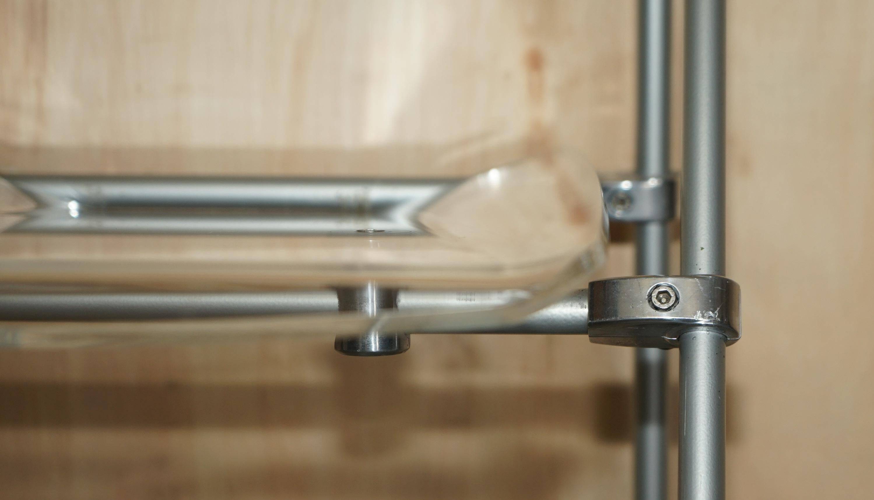 Metal and lucite folding chair, swivel backrest.