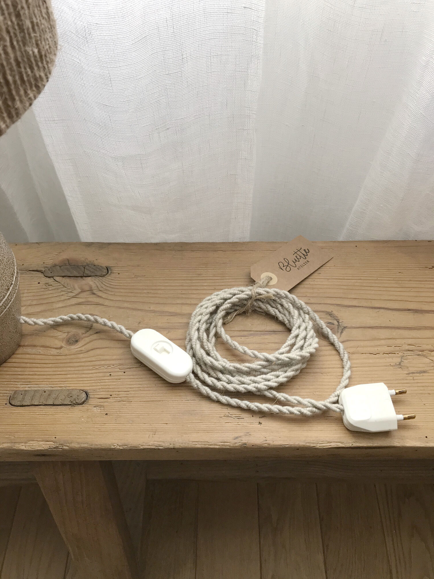 Sandstone lamp and jute string