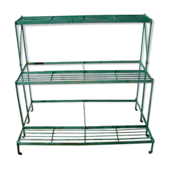 Old riveted metal plant door