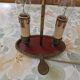Old silver-plated bronze lamp, except for the arms which are not silver.