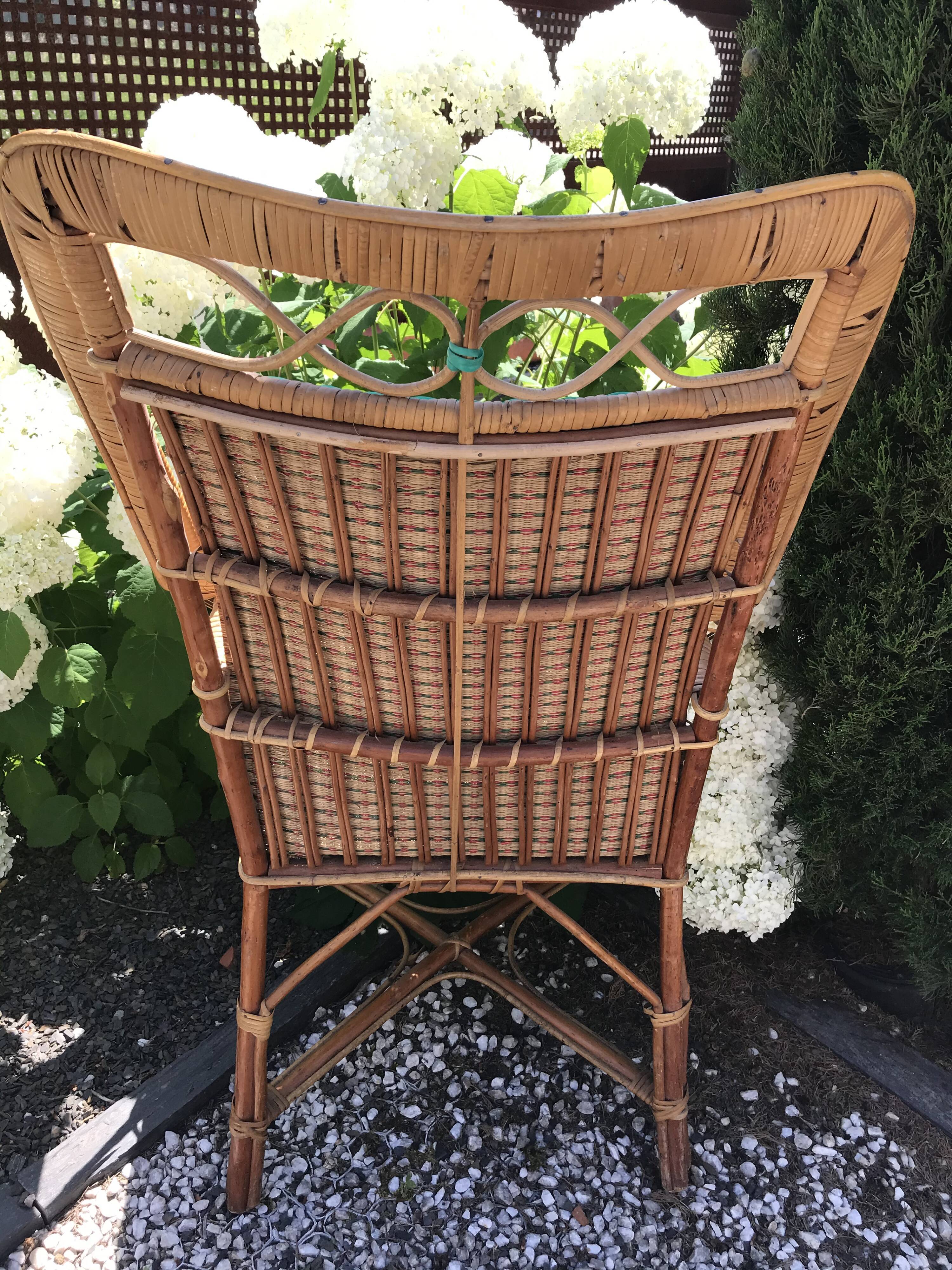 Rattan armchair with high back