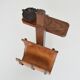 Vintage leather magazine rack with shelf and brutalist/rustic ashtray.