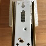 Metal and glass wall light