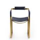 Armchair, aged brass and navy blue leather, contemporary style.