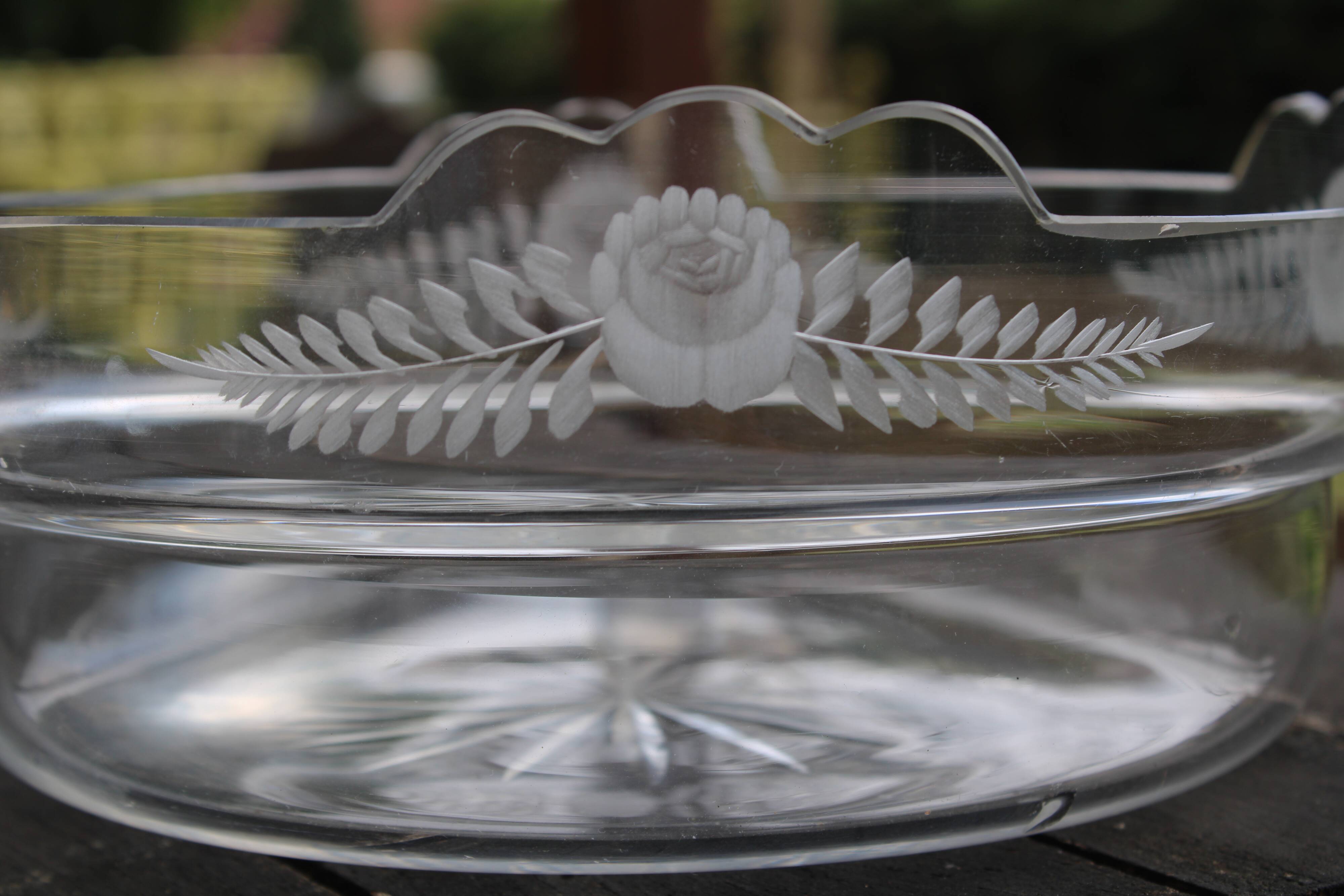 Worked metal fruit basket and glass