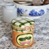 Vintage sugar bowl with gingham pattern hat and peach barbotine pattern